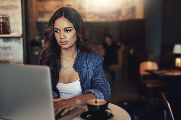 Freelancer, research and woman in cafe with computer, typing info and planning for article angle. Restaurant, female content writer with laptop and self employed with publication and remove work