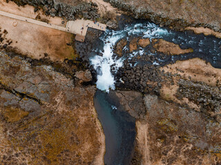Aerial panorama of the Oxarafoss waterfalls in Iceland. Oxarafoss also called Oxararfoss is located in the Thingvellir National Park on the Oxara River. The tectonic plates of America and Eurasia.