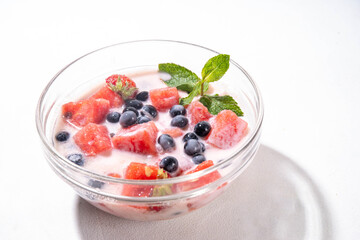 Subak Hwachae cocktail, Korean traditional watermelon punch salad drink, with a lot of fruit...