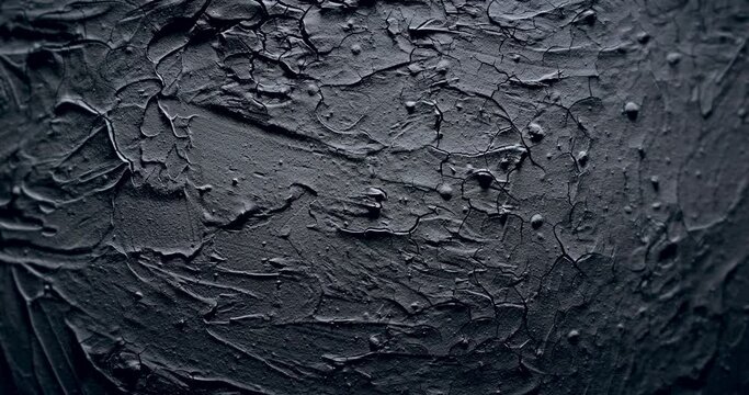 Dark crumpled texture surface. Used as a background and texture.