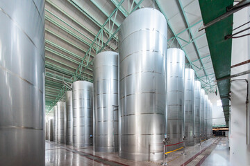 Fototapeta premium Wine storage tank in the red wine production workshop 