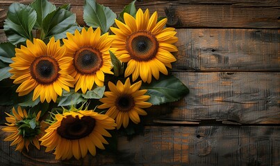 Obraz premium Autumnal banner featuring yellow sunflowers in a bouquet on a vintage wooden surface with ample copy space.