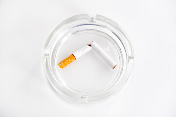 Broken Cigarette in Ashtray Closeup