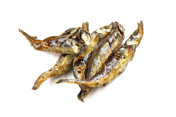 Seafood. Fried small sea fish, anchovies, capelin fish, isolated on white background