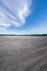 Asphalt road square with sky clouds natural landscape. Car background.