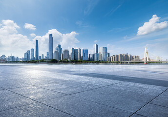 Empty square floor with modern city buildings scenery in Guangzhou. car advertising background.