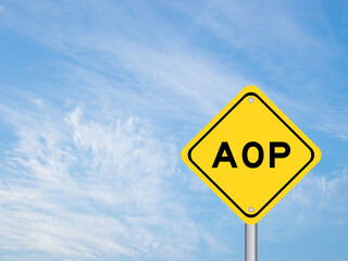 Yellow transportation sign with word AOP (abbreviation of Annual Operating Plan or Aspect-oriented programming) on blue color sky background