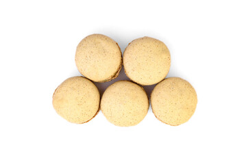 Macaroons with pistachio filling isolated on white background.