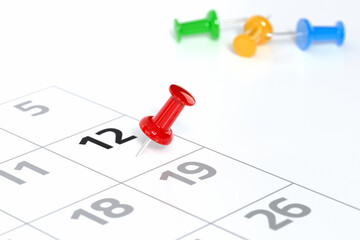 Calendar with Red Pushpin. Date Concept Using White Background and Simple Composition. 3d Rendering