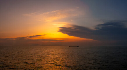 Obraz premium Sunset over the strait separation the Hokaido and Honshu Islands of Japan