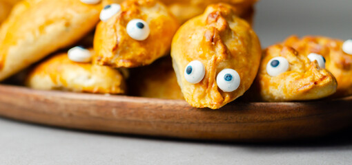 Fototapeta premium A tray of pastries with sweet eyes on them