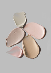 Cosmetic bb or cc cream set swatch isolated on gray