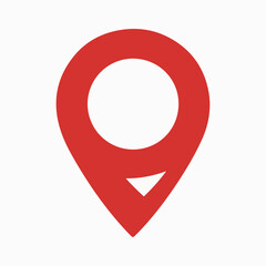 A red location pin icon, commonly used in maps and navigation applications. The pin is designed with a triangular shape pointing downwards, and it has a circular hole in the top center.