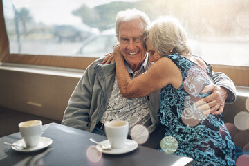 Coffee, hug and senior couple on date, portrait and conversation of past, love and retirement. Commitment, woman and man with embrace, happy and talking of marriage, together and break in weekend