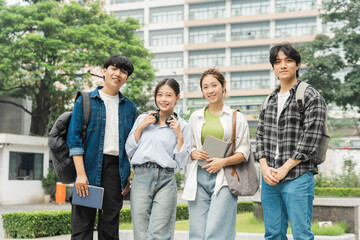 Portrait image of a group of Asian students at university.