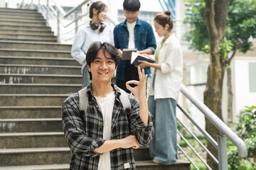 Portrait image of a group of Asian students at university.