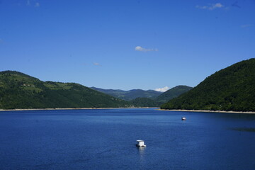 Nature reserve park Uvac river with beautiful mountains, green lush forest, clear sky with no clouds and blue water and bald eagles in south Serbia in the Balkans in Europe