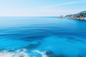 Fototapeta premium High angle shot of the ocean in different shades of blue in samos, greece