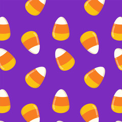 Candy corn seamless pattern isolate on purple background.Repeat pattern with Halloween element.Graphic vector illustration.