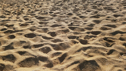 sand pattern of beach at summer, sand texture background, footprints in the sand