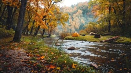 A peaceful riverside campsite with a view of a gently flowing river and vibrant autumn foliage in the background.