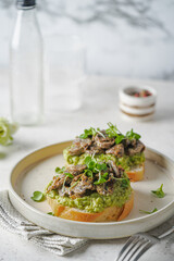 Toast avocado and mushrooms