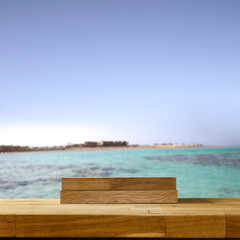 Wooden pier on the sea with copy space for products.