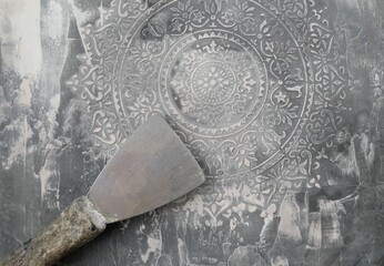 Stucco art wall with ornamented mandala, stucco technique with spatula, wall ornament, gray old...