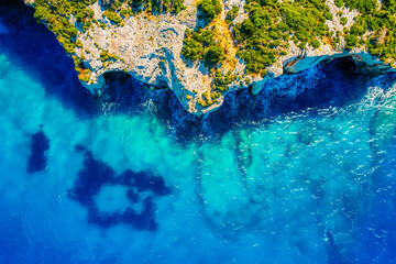 Blue caves on Zakynthos island or Zante Island, Greece. Beautiful views of azure sea water and nature with cliffs cave