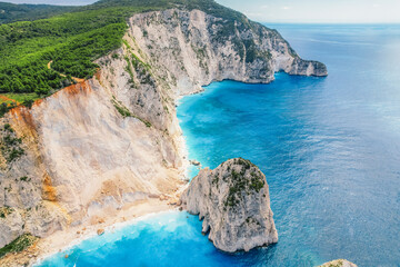 Obraz premium Myzithres beach near Keri Lighthouse on Zakynthos island or Zante Island, Greece. Beautiful views of azure sea water and nature with cliffs
