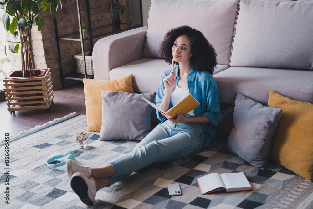 Sticker Photo of charming pretty cute dreamy woman wear stylish shirt sit carpet hold planner book cozy room indoors