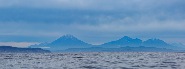 Summer Landscape Petropavlovsk Kamchatsky and Koryaksky Volcano. Concept Travel photo Kamchatka Peninsula Russia