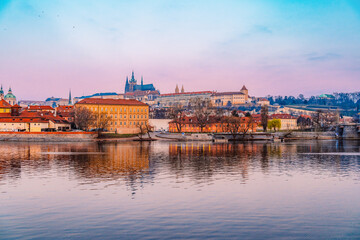 View of the city of Prague castle in hradcany and the Vltava river with Charles bridge in Prague, Czech Republic.