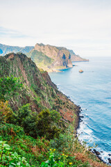 Views from Cabo de Larano viewpoint and Vereda do Larano coastal hiking trail. Cliffs atlantic ocean and tropical mountains vegetation. Madeira island in Portugal