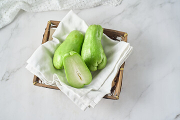 Fresh chayote, Sechium edule, ingredient for asian and mexican cuisine
