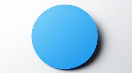 Fototapeta premium A blue round paper sticker on a white background