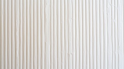 Obraz premium A piece of white textured cardboard placed against a plain background