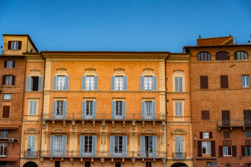 Siena, medieval town in Tuscany, with view of the Dome & Bell Tower of Siena Cathedral,  Mangia Tower and Basilica of San Domenico, Italy