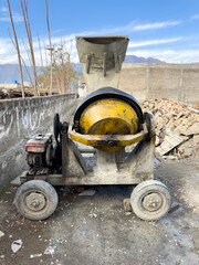 Yellow Cement Mixer at Construction Site