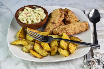 chicken finger  served with potato wedges