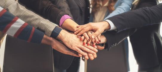 Business Team Hands Together in Unity - Teamwork and Collaboration Concept