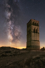 Night view of the tower of the Mudejar church in the depopulated area of ​​Villacreces,...