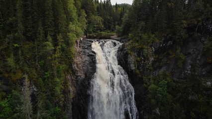 Autumnal landscape of Homla river near Hommelvik, middle Norway. Area of Storfossen waterfall. Bird point of view - Aerial Shot