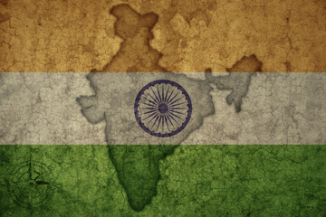 map and flag of india on a old vintage crack paper background .