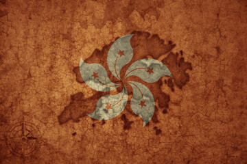 map and flag of hong kong on a old vintage crack paper background .