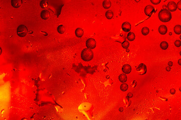 macro cola drink texture,macro soft drink texture,Close up view of ice cubes in dark cola background. Textures of sweet summer cold drinks