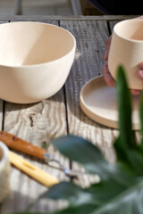 hands working ceramics