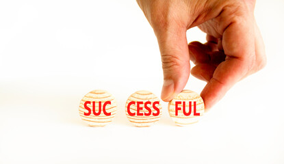 Successful symbol. Concept word Successful on beautiful wooden circles. Beautiful white table white background. Businessman hand. Business successful concept. Copy space.
