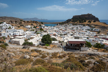 Distant view of Lindos village, Rhodes island on sunny day