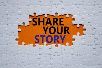 Share your story symbol. White puzzle with words Share your story. Beautiful orange background. Business and Share your story concept. Copy space.